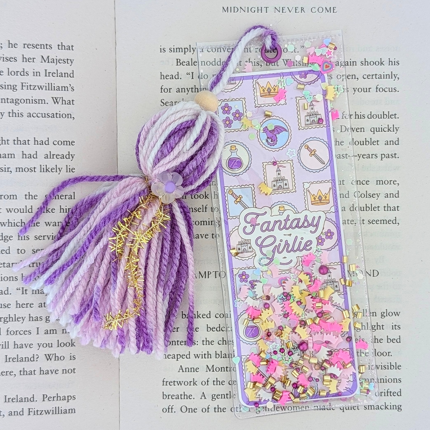Decorative bookmark with tassel on a book page