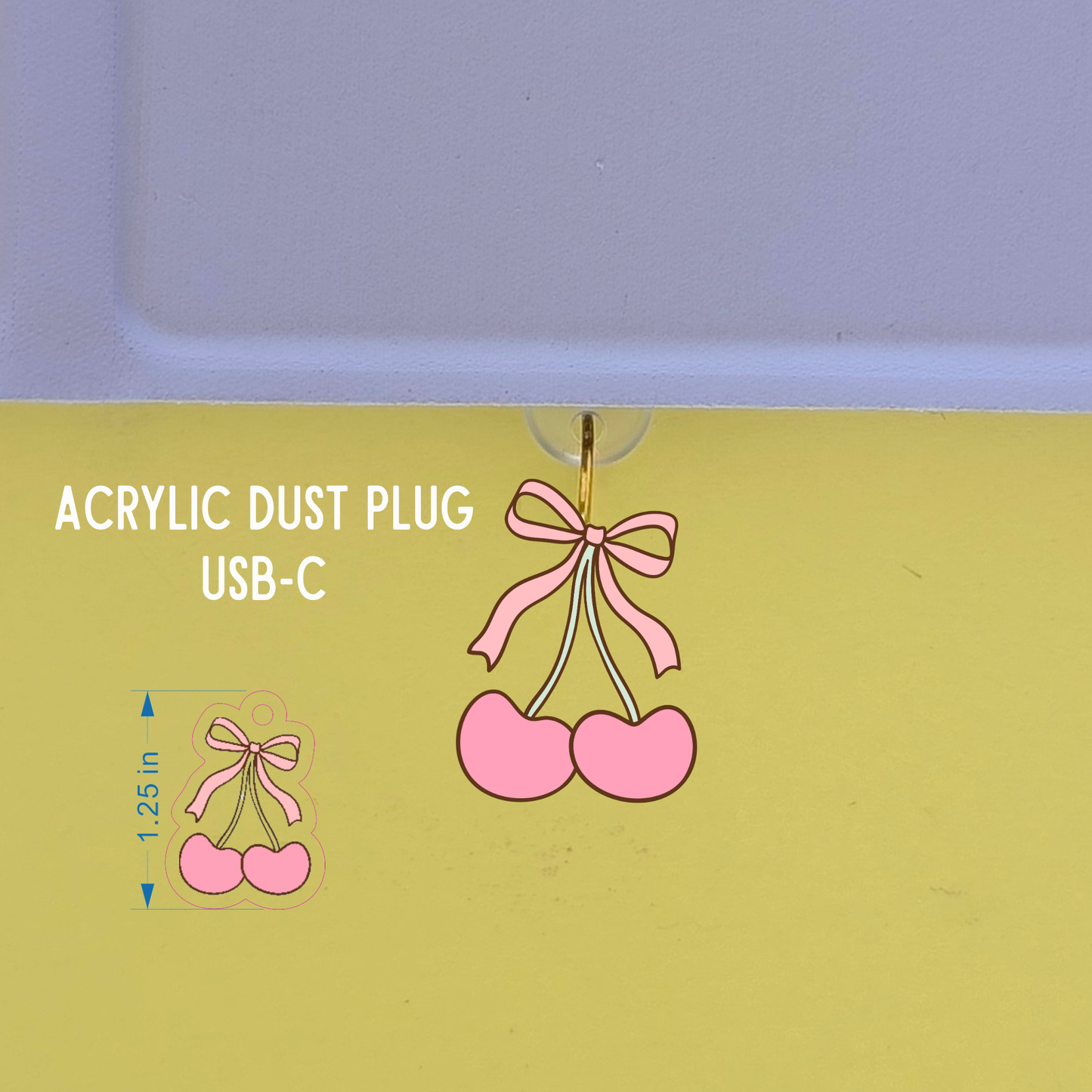 Acrylic dust plug with cherry design on a green background