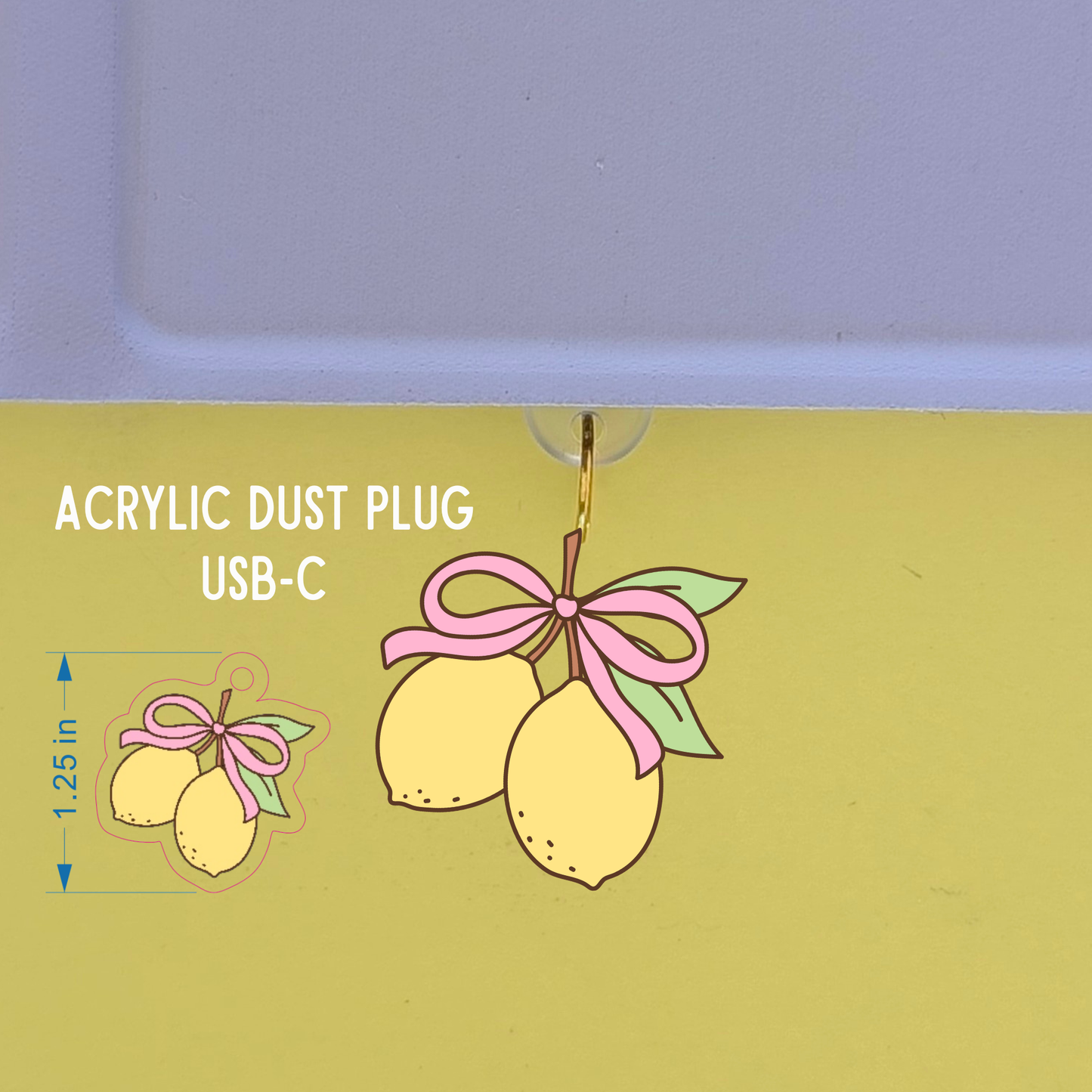 Acrylic dust plug with lemon design on a green background