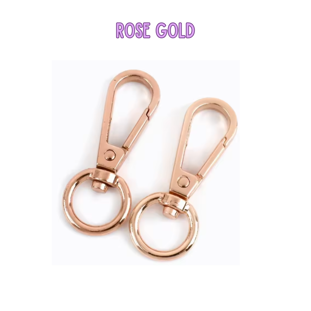 Two rose gold keychains on a white background with 'ROSE GOLD' text above.