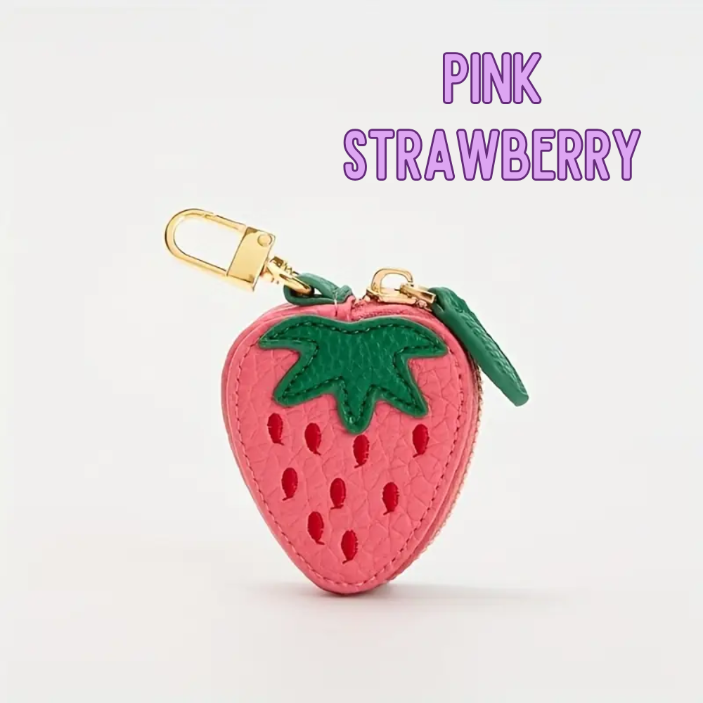 Pink strawberry-shaped keychain with green leaves on a white background, branded 'Pink Strawberry'.
