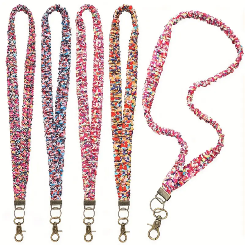 Set of colorful lanyards with keychain attachments on a white background