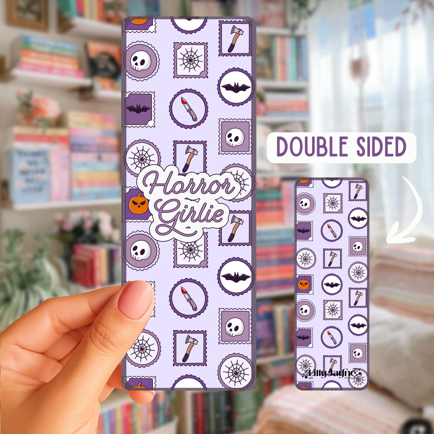 Double-sided phone case with 'Horror Girlie' design held by a hand in a room with books and decor.