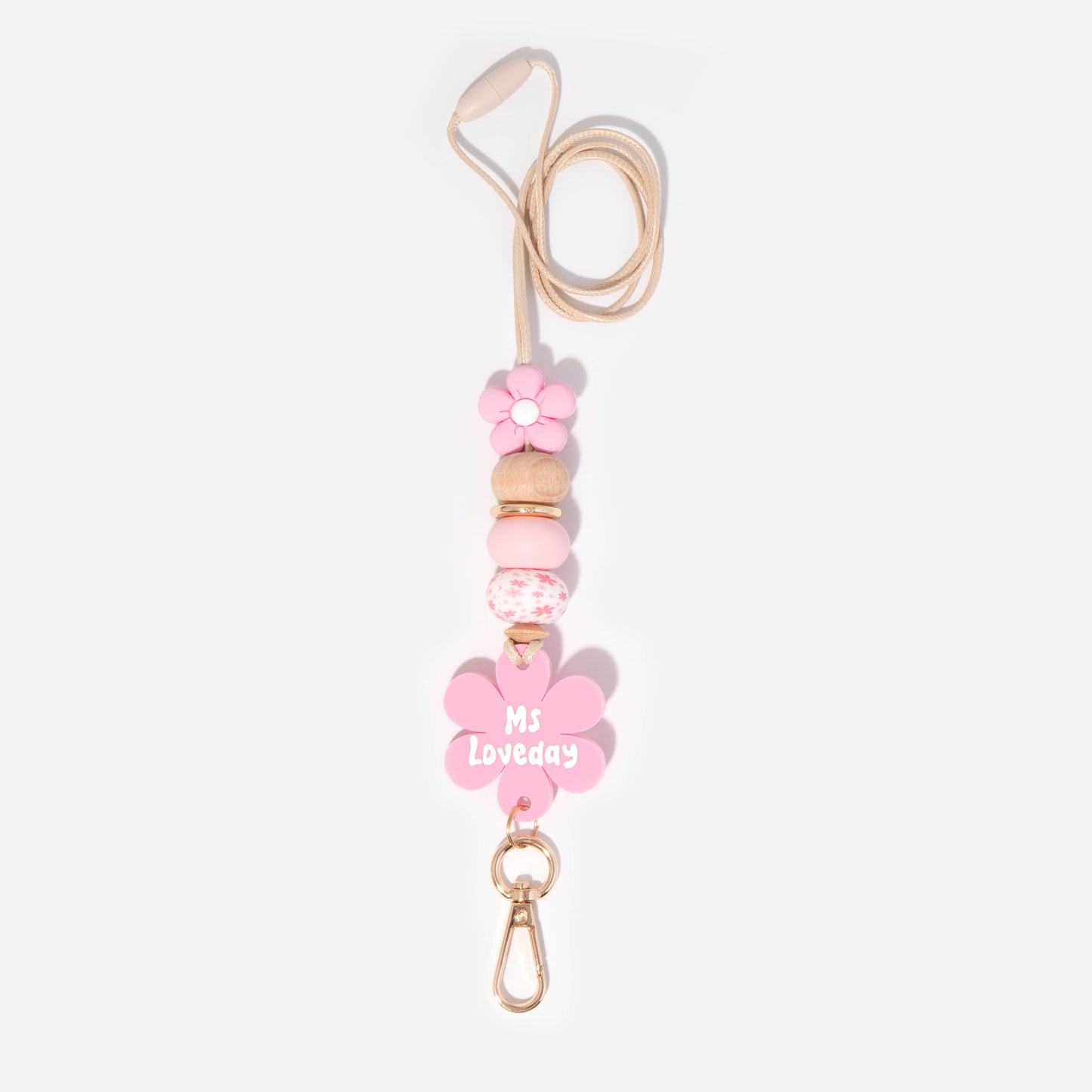 Lanyard with pink flower silicone focal beads and a matching pink flower personalised name disc. With wooden Bead and pretty pink silicone beads.