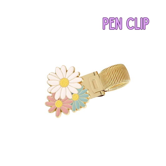 Pen clip with floral designs on a white background