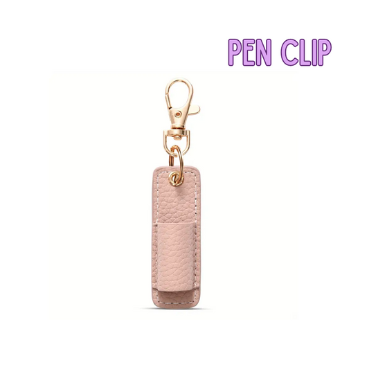 Pink pen clip with gold clasp on a white background
