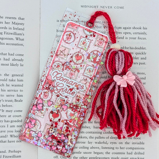 Decorative bookmark with tassels on a book page