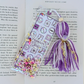 Decorative bookmark with tassel on a book page