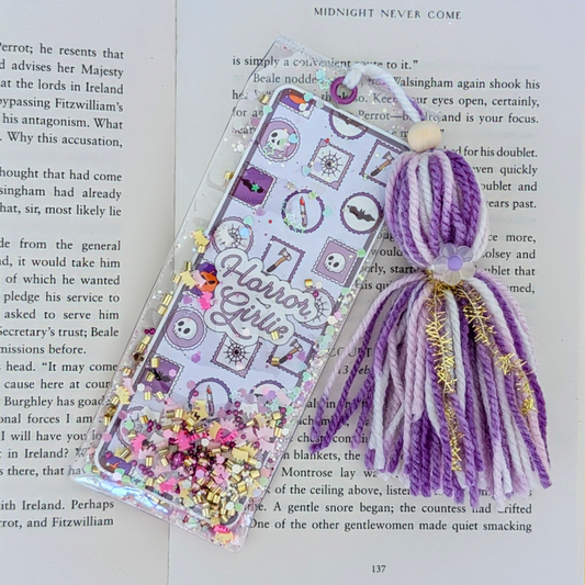 Decorative bookmark with tassel on a book page