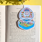 Colorful children's book with open pages on a yellow background