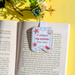 Book with a decorative bookmark on a yellow background
