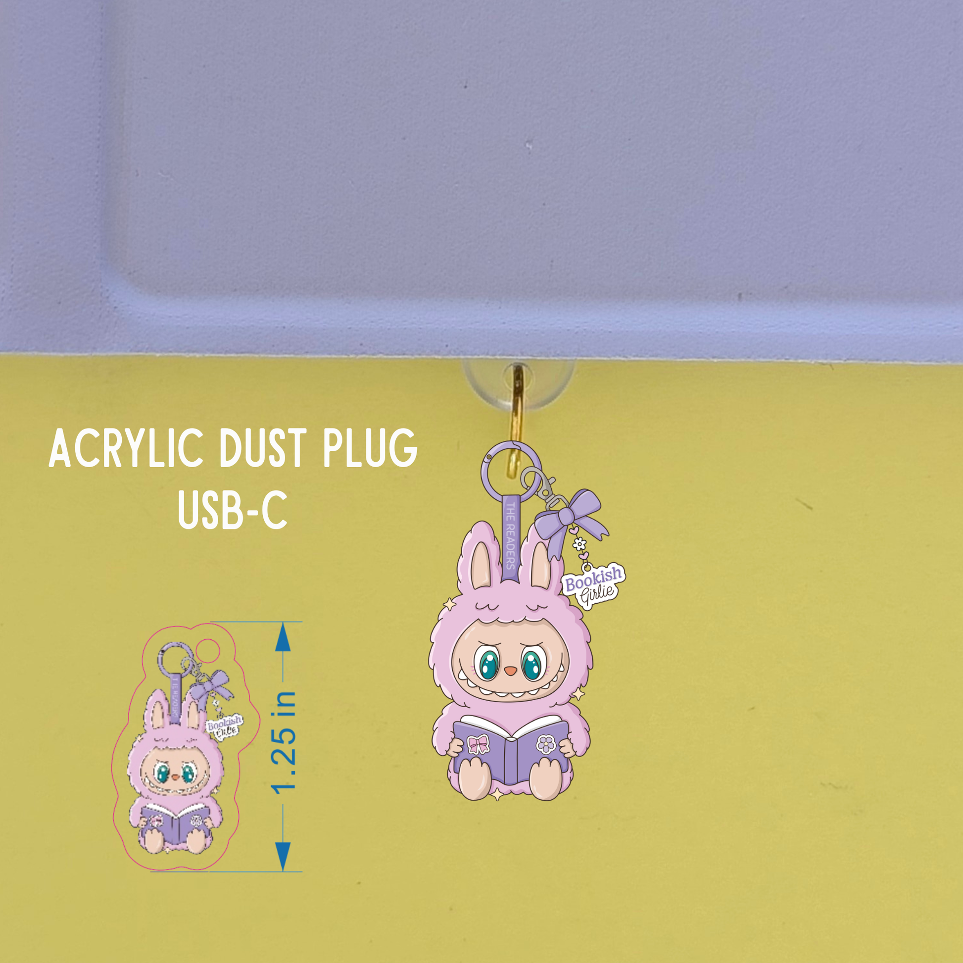 Acrylic dust plug with a cute character design on a green background