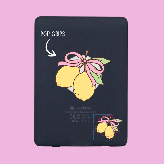 Black phone grip with lemon design on a pink background