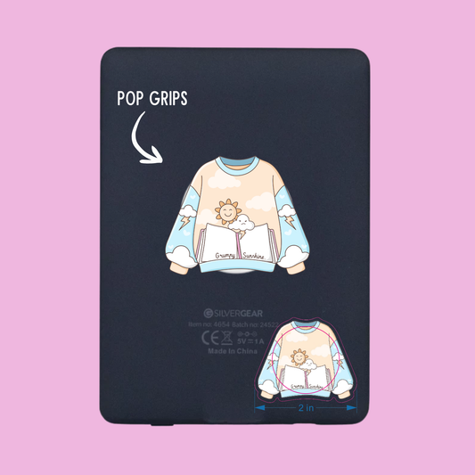 Black pop grip with cartoon design of a sweater on a pink background