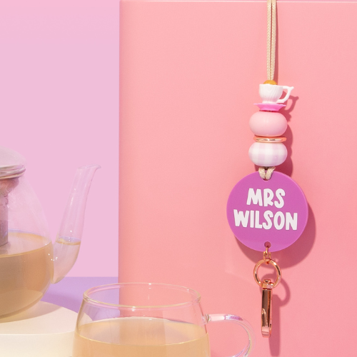 Keychain with 'Mrs Wilson' on a pink background
