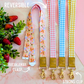 Reversible lanyard with floral and checkered patterns on a pink background with strawberries.
