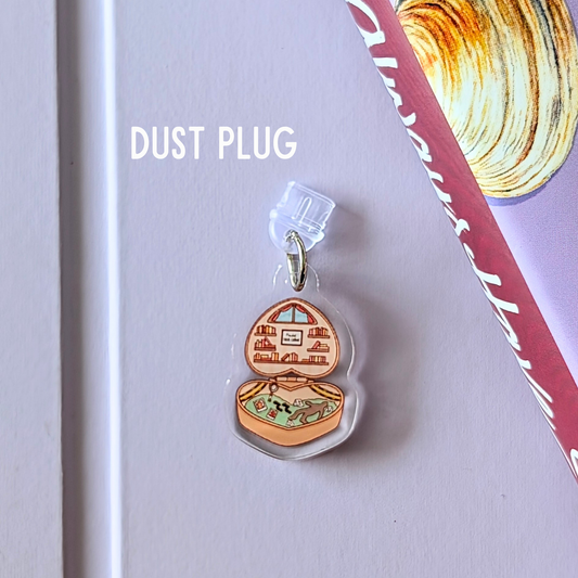 Dust plug with a decorative design on a light purple background