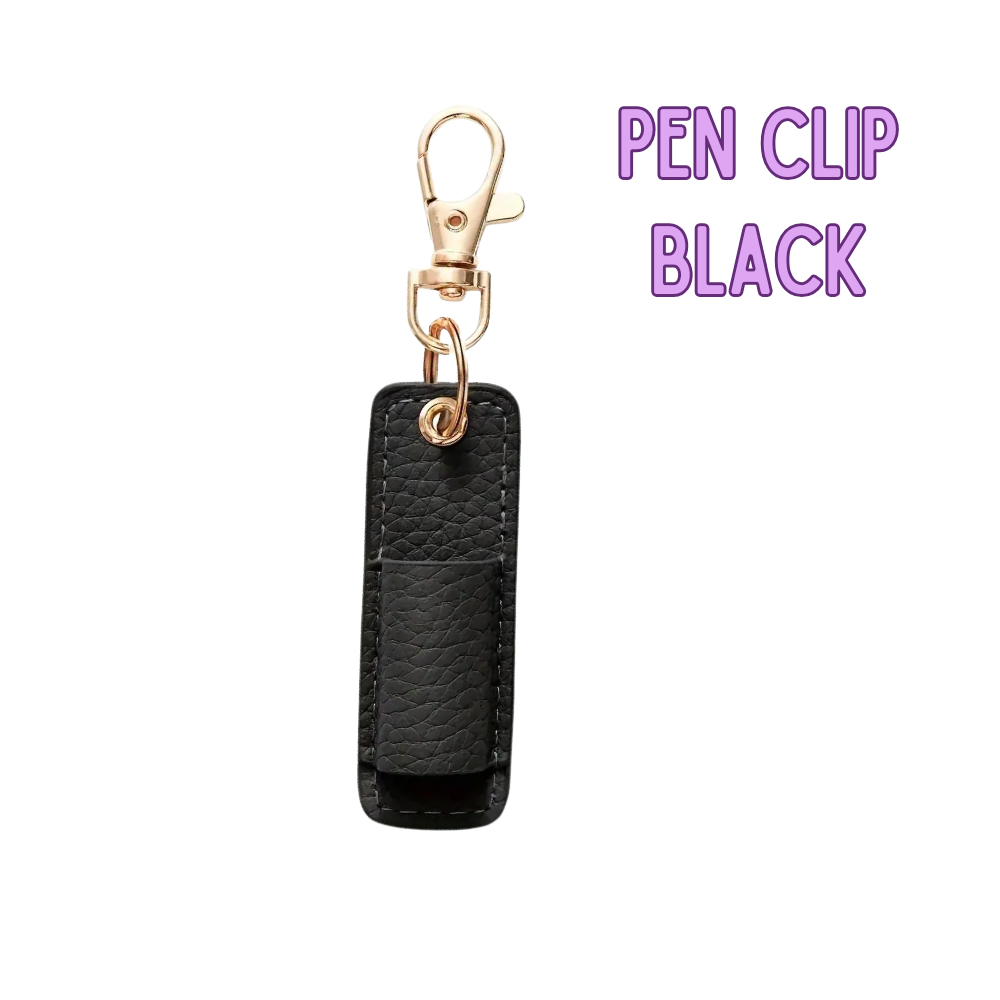 Black pen clip with gold clasp on a white background