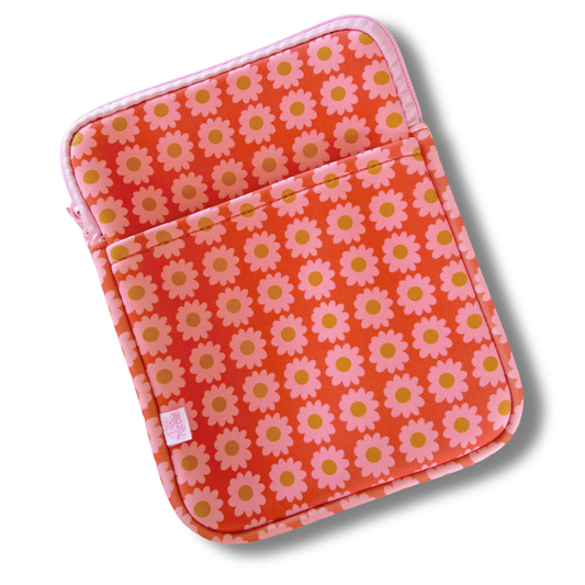 Floral patterned pouches on a white background