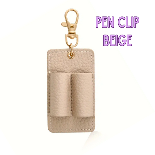 Beige pen clip with gold clasp on a white background