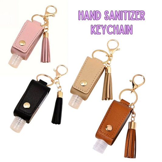 Hand sanitizer keychains with tassels in pink, beige, black, and brown on a white background.