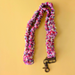 Multicolored scrunchie lanyard on a yellow background