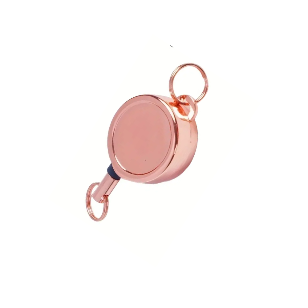 Rose gold retractable keychain on a white background