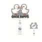 Two cartoon ducks with 'GOOSE BUMPS' text on a gray background, featuring a clip-on badge holder.