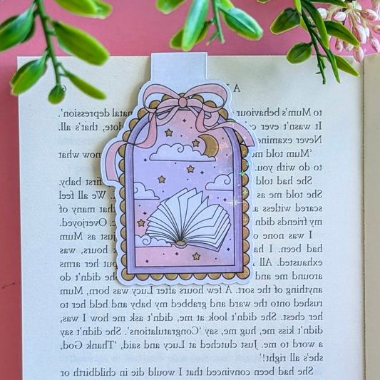 Decorative bookmark with a book design on a page with text