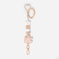 Lanyard with white flower silicone focal beads and a beige coloured flower personalised name disc. With wooden Bead and white and beige silicone beads.