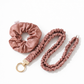 Pink scrunchie set with keychain on a white background