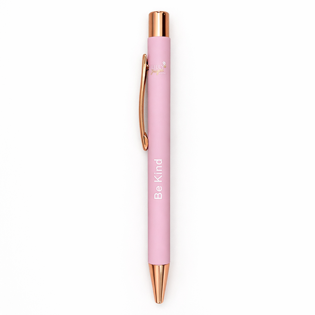 Pink pen with rose gold accents and 'Be Kind' text on a white background