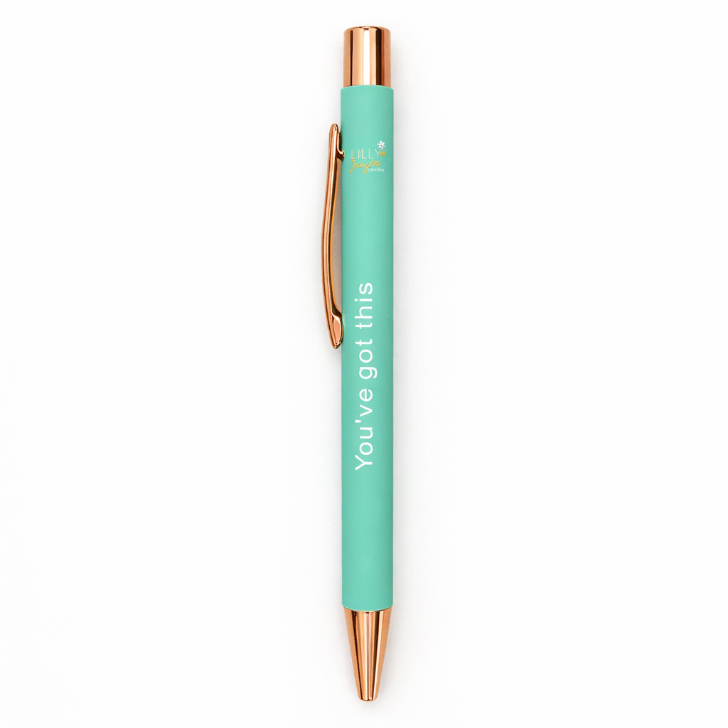 Mint green pen with rose gold accents on a white background