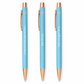 Three blue pens with rose gold accents and motivational phrases on a white background