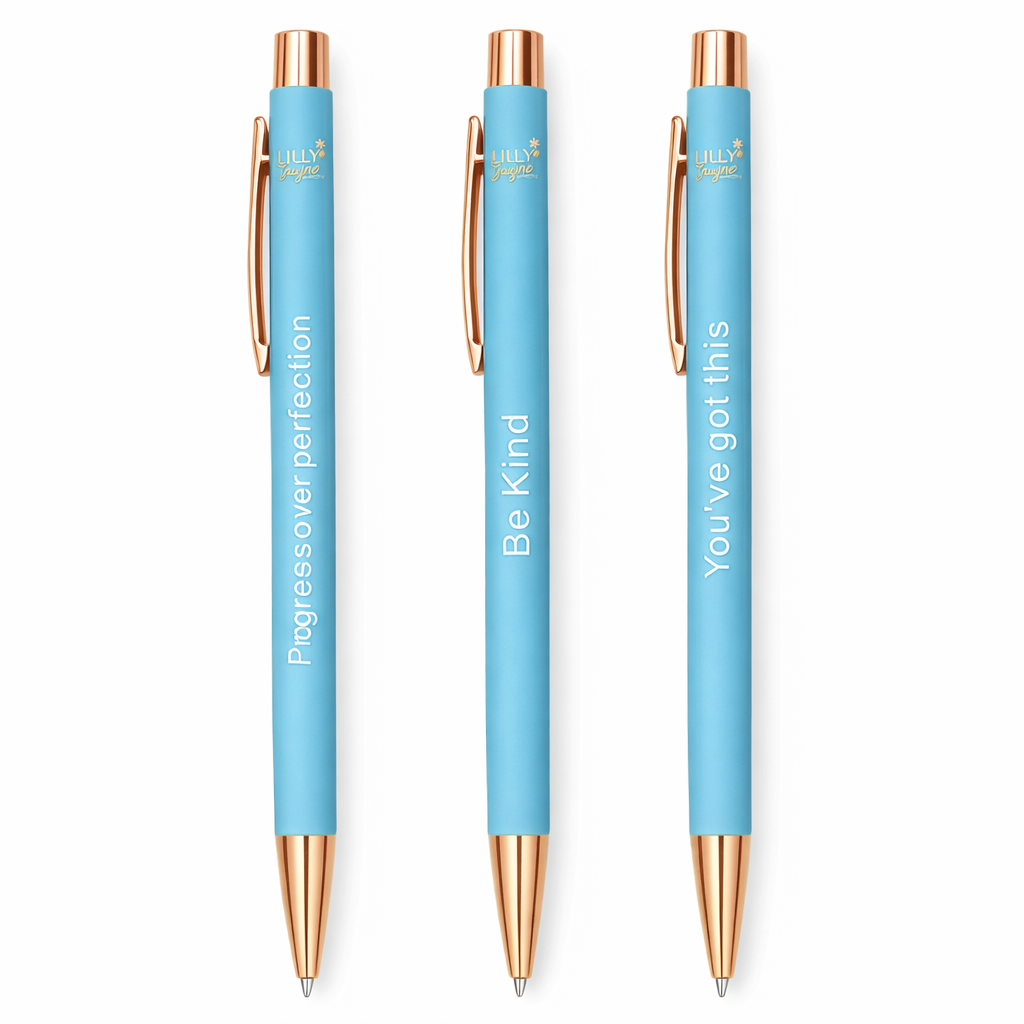 Three blue pens with rose gold accents and motivational phrases on a white background