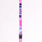 Pink and purple lanyard with decorative patterns on a white background