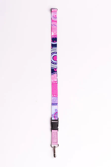 Pink and purple lanyard with decorative patterns on a white background