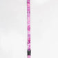Pink floral patterned lanyard on a white background