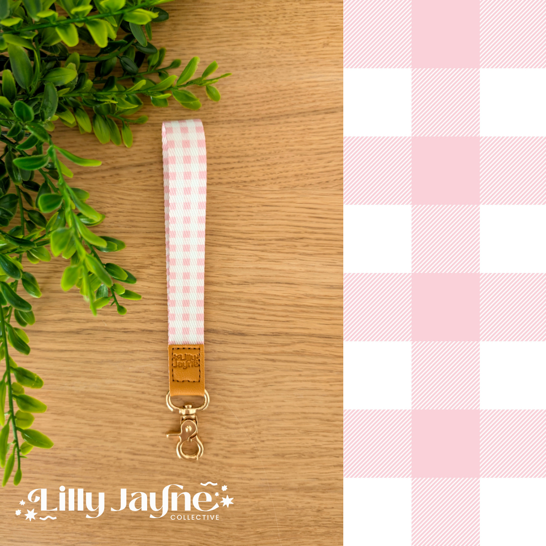 Pink Gingham Wristlet with tan branded accent and gold clasp