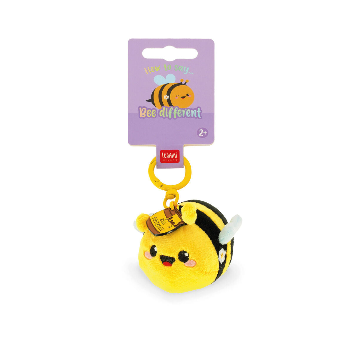 Plush bee keychain with a tag on a white background