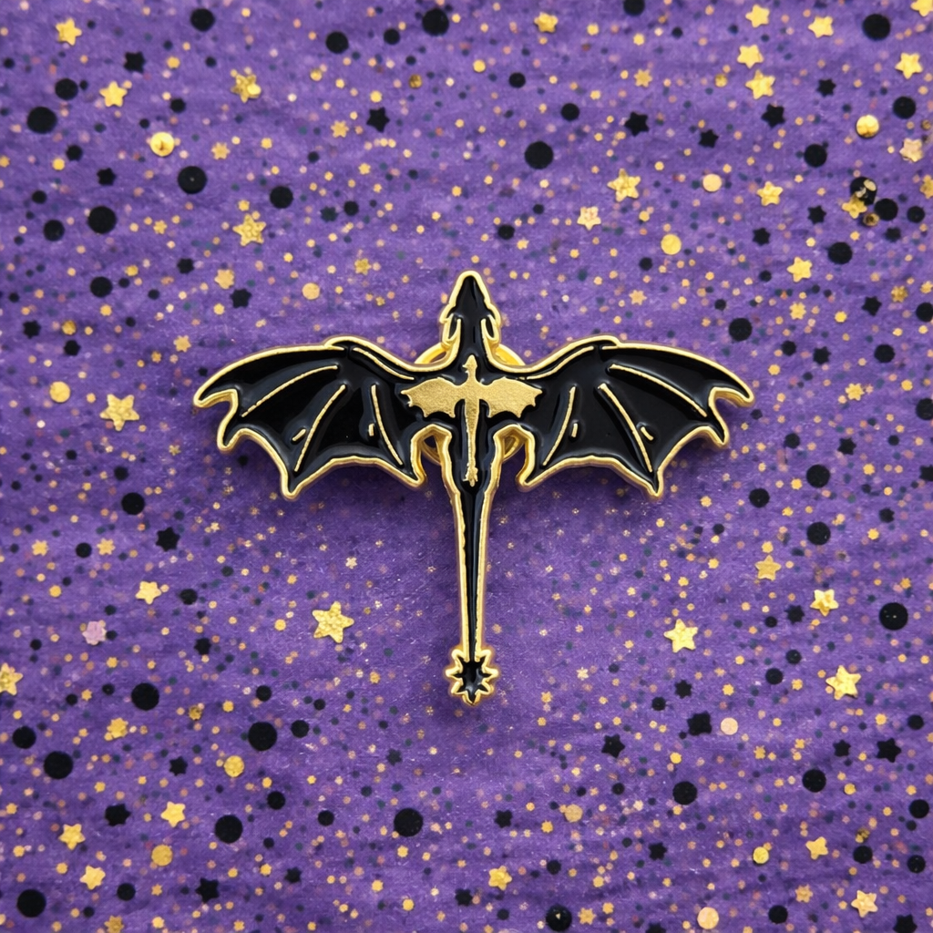Bat-shaped pin on a purple background with star and circle patterns