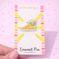 Enamel pin on a colorful card with 'Lilly Jayne Collective' branding