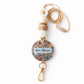 Decorative lanyard with floral design and 'Mrs Blume' text on a white background