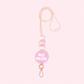 Pink badge holder with 'MRS WILSON' text on a light pink background