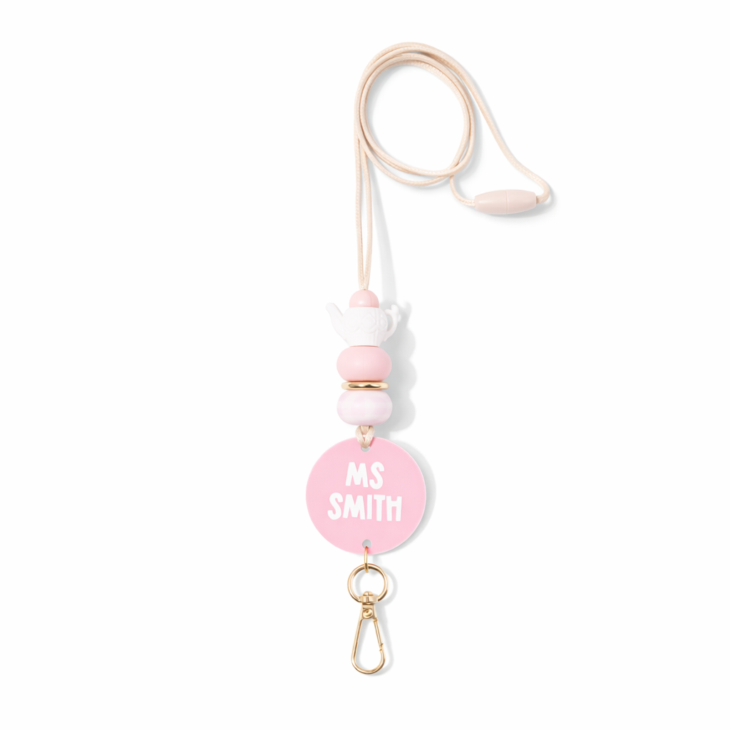 Pink badge holder with 'MS SMITH' text on a white background