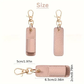 Pink keychain case with measurements on a white background