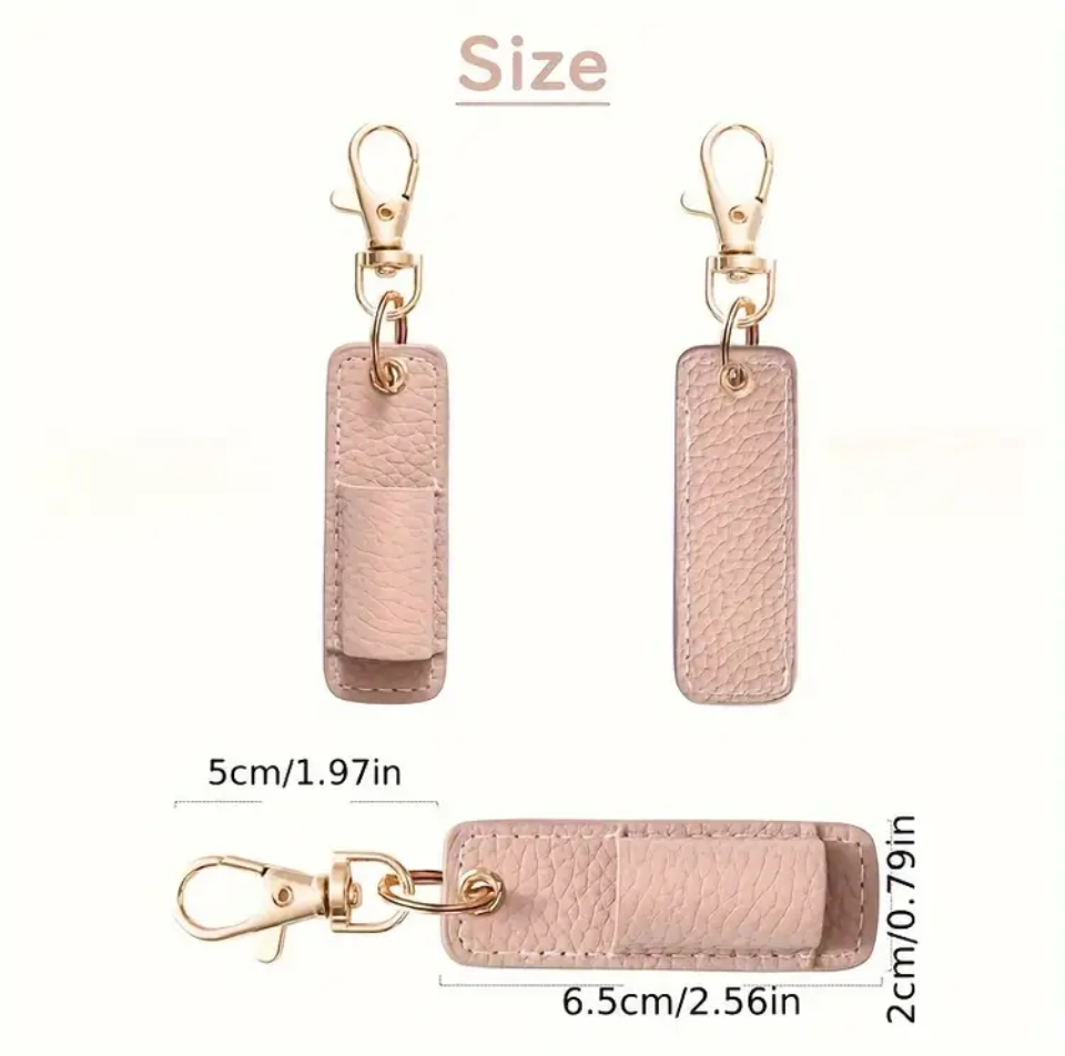 Pink keychain case with measurements on a white background