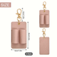Pink leather keychain with dimensions and clip on a white background