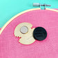 Magnetic device on a pink fabric background